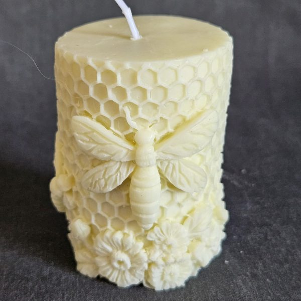 bee on honeycomb candle